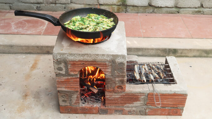 Creative wood stove from cement and brick, Great two-in-one wood stove idea
